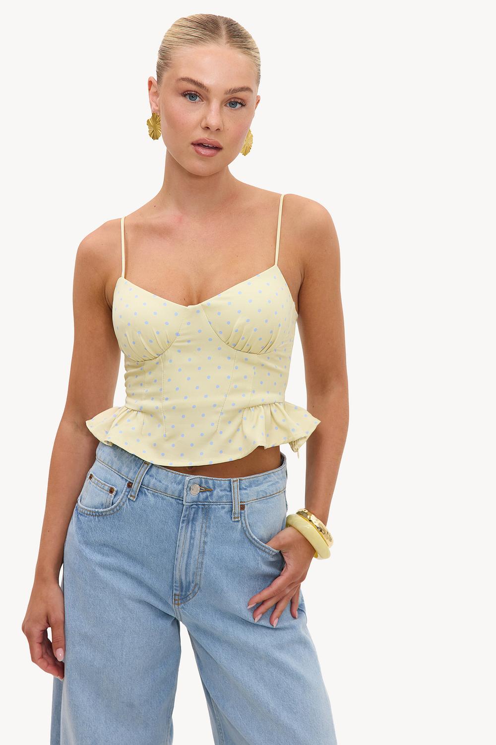 Haut jaune beurre à pois bleu clair
