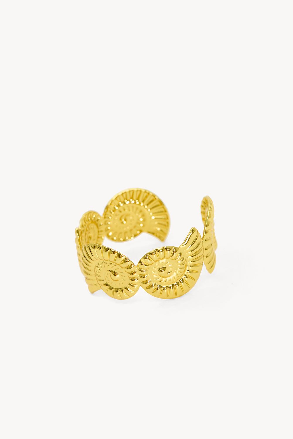 Gold cuff bracelet with shell detailing