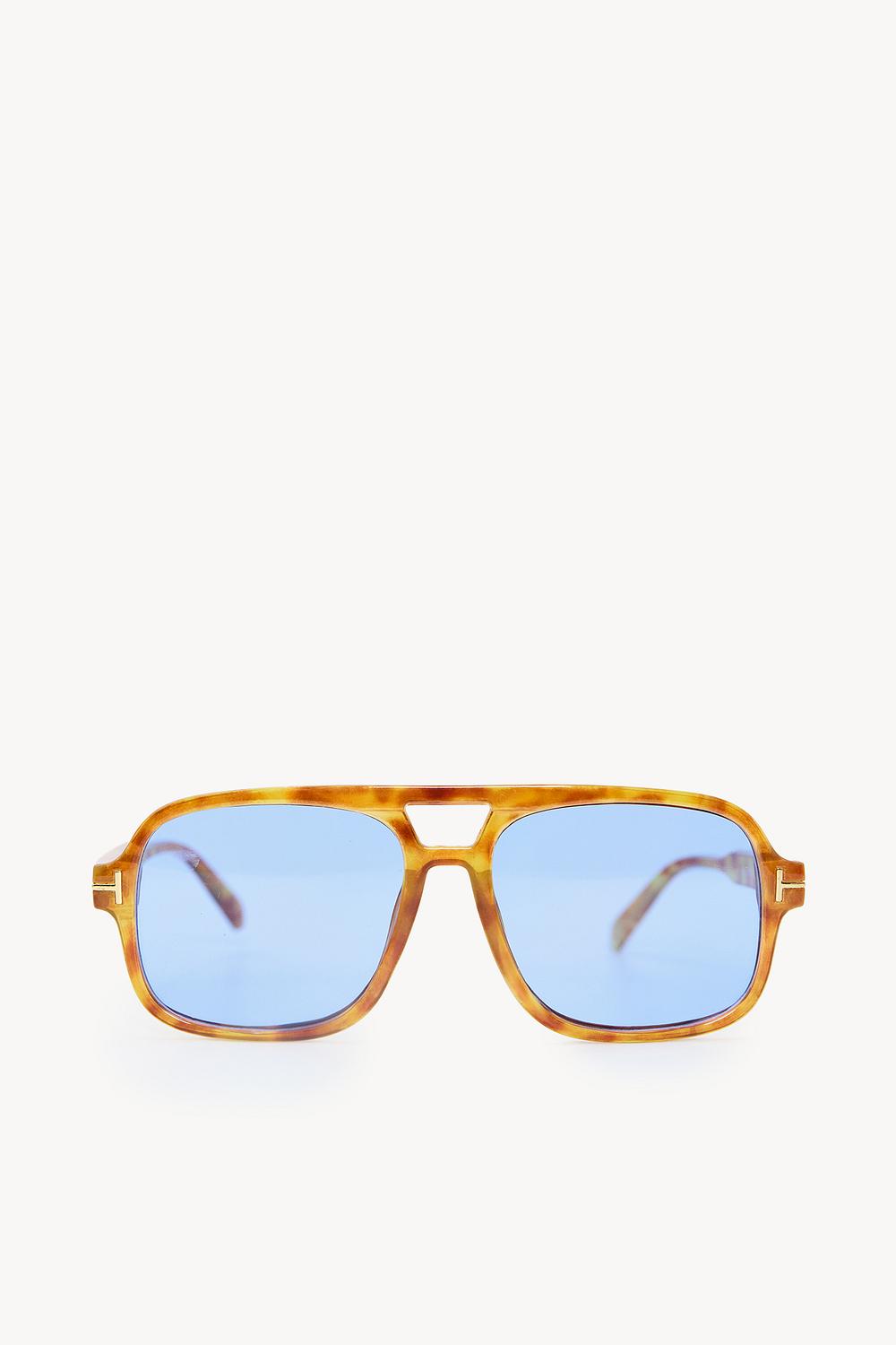 Gafas de sol amarillas con cristales azules