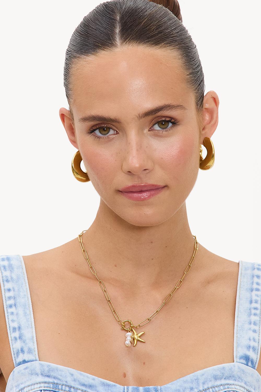 Gold link chain with charms and pearls