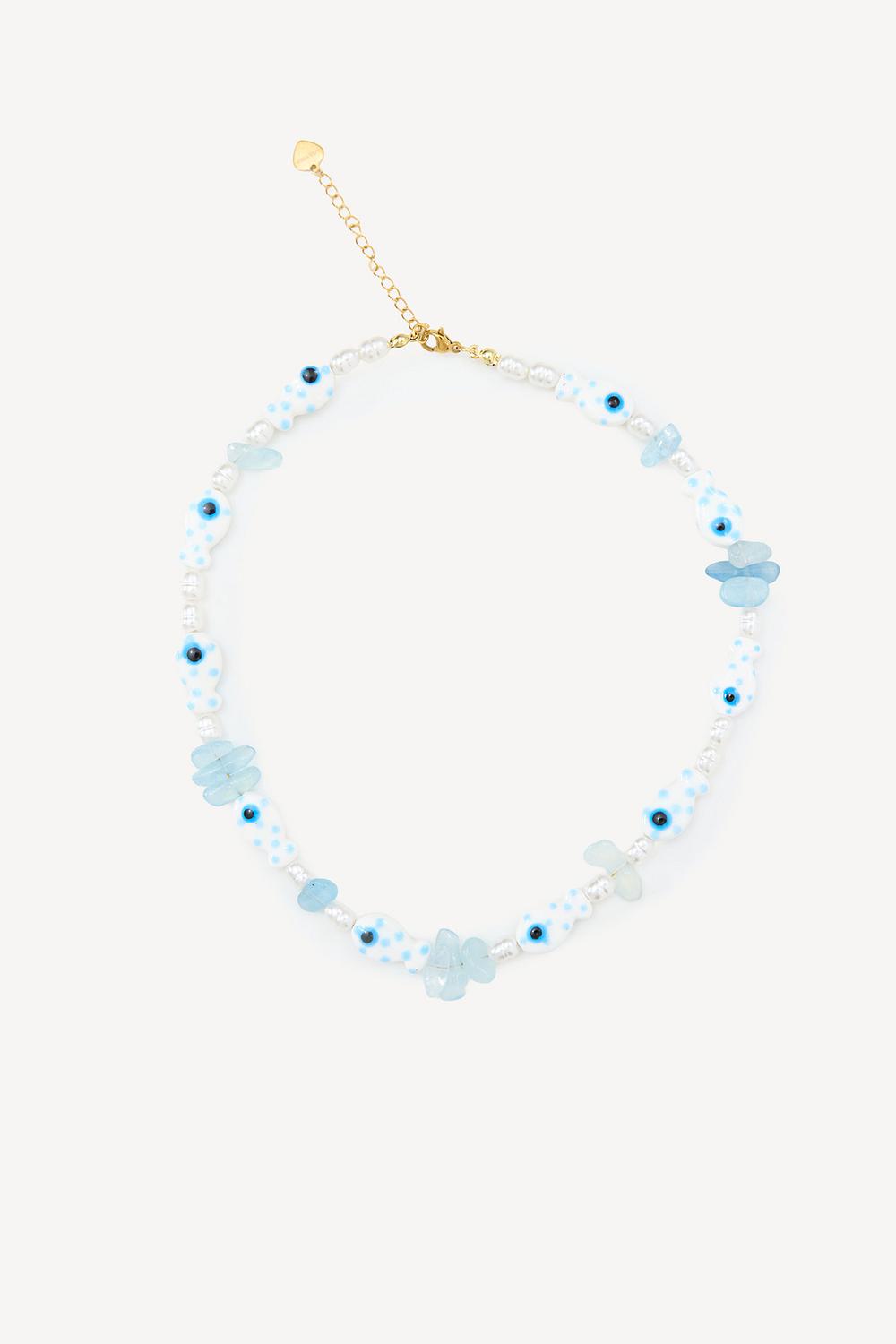 Blue necklace with stone and bead charms