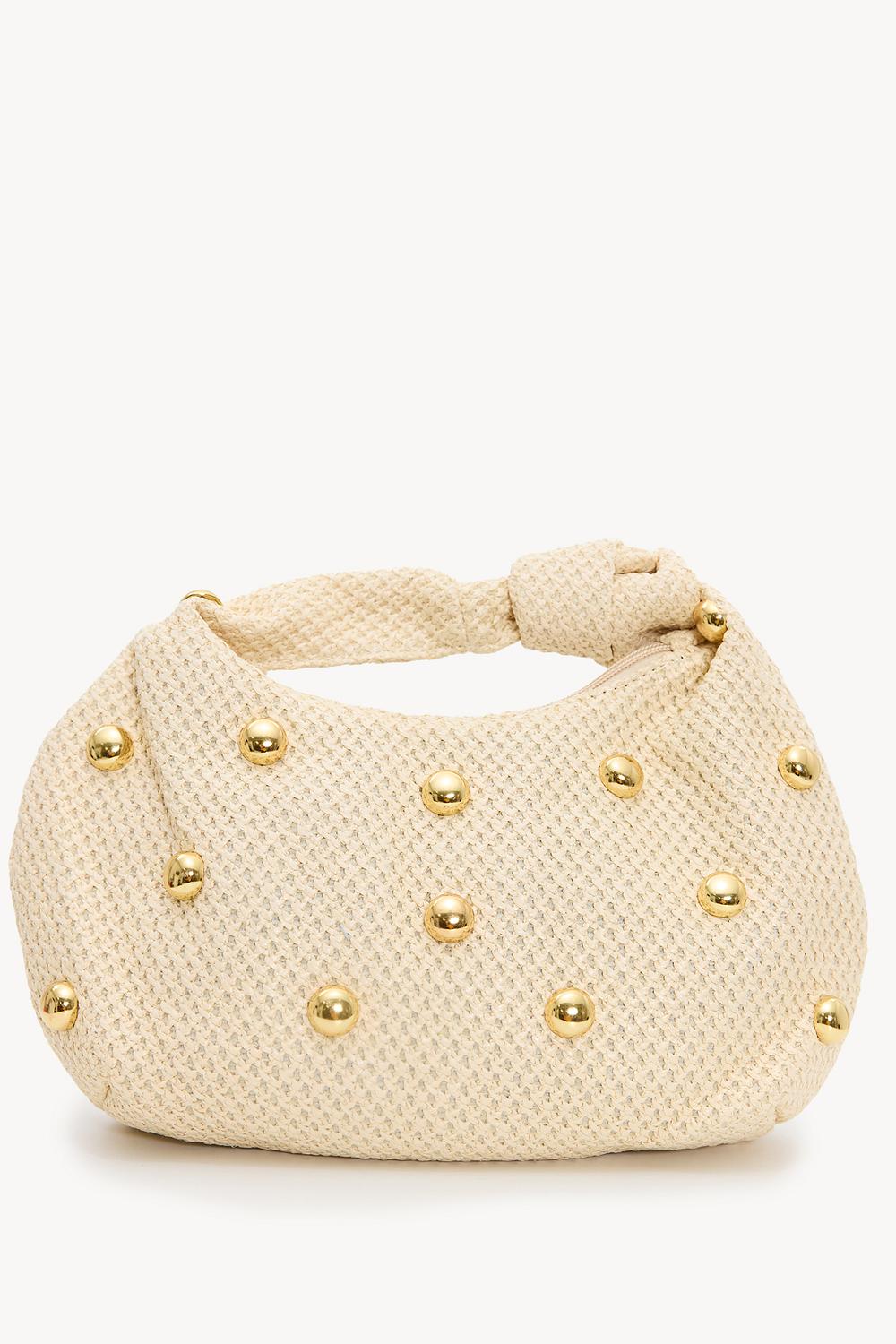 Bolso crudo con tachuelas doradas