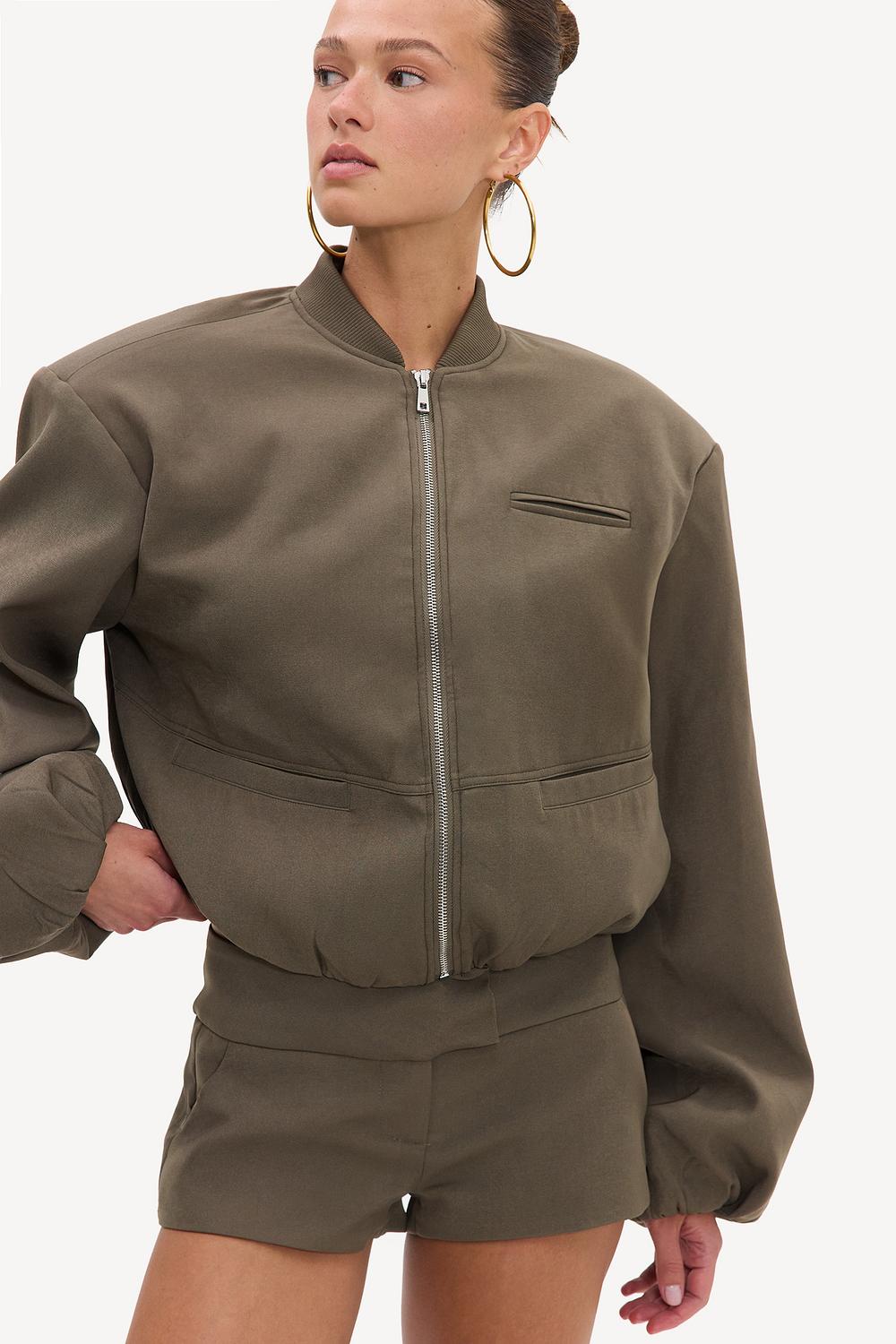 Light green cropped bomber jacket with shoulder pads