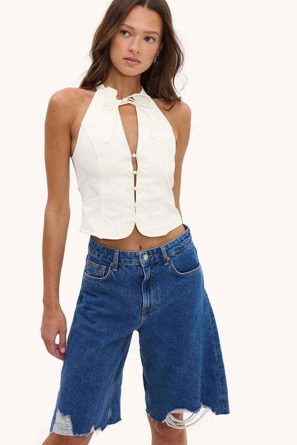 White denim top with a bow