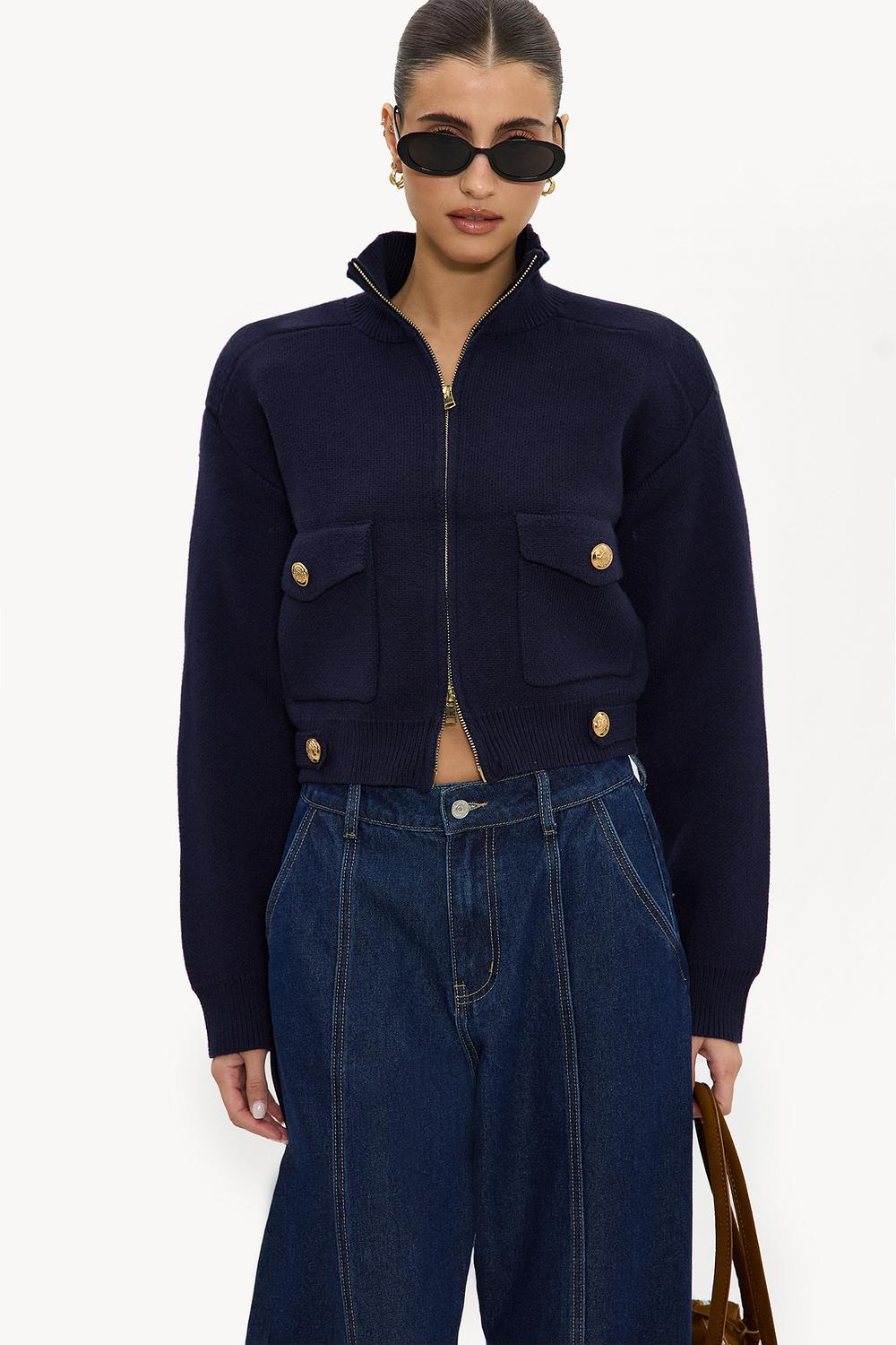 Dark blue cardigan with a zipper and shoulder pads