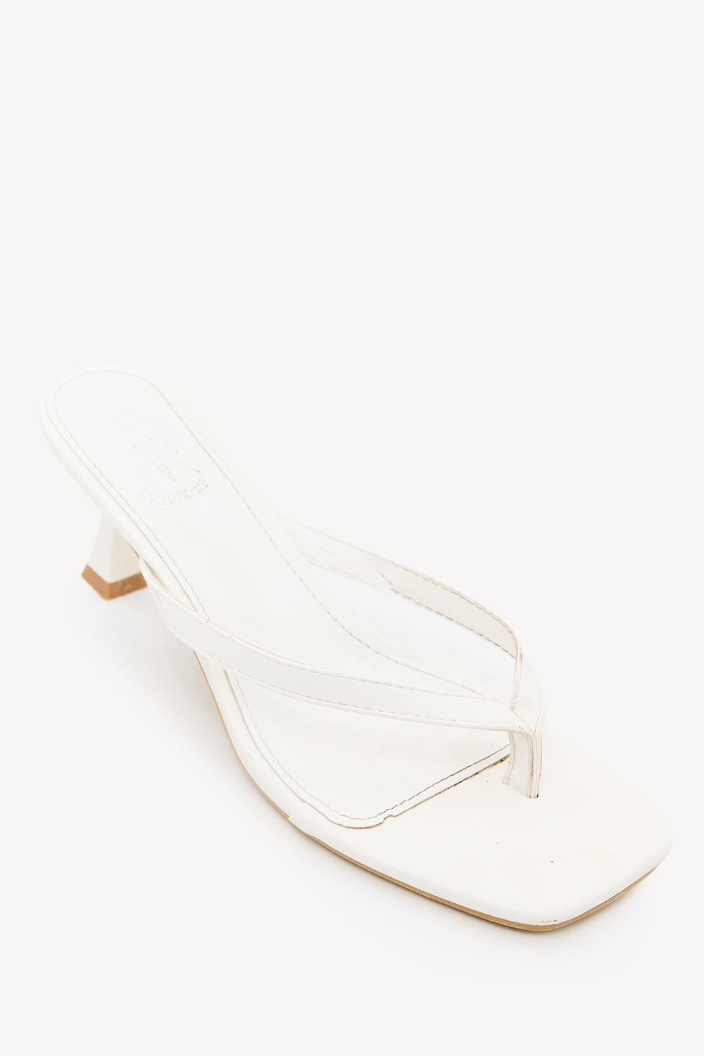 White heeled sandals