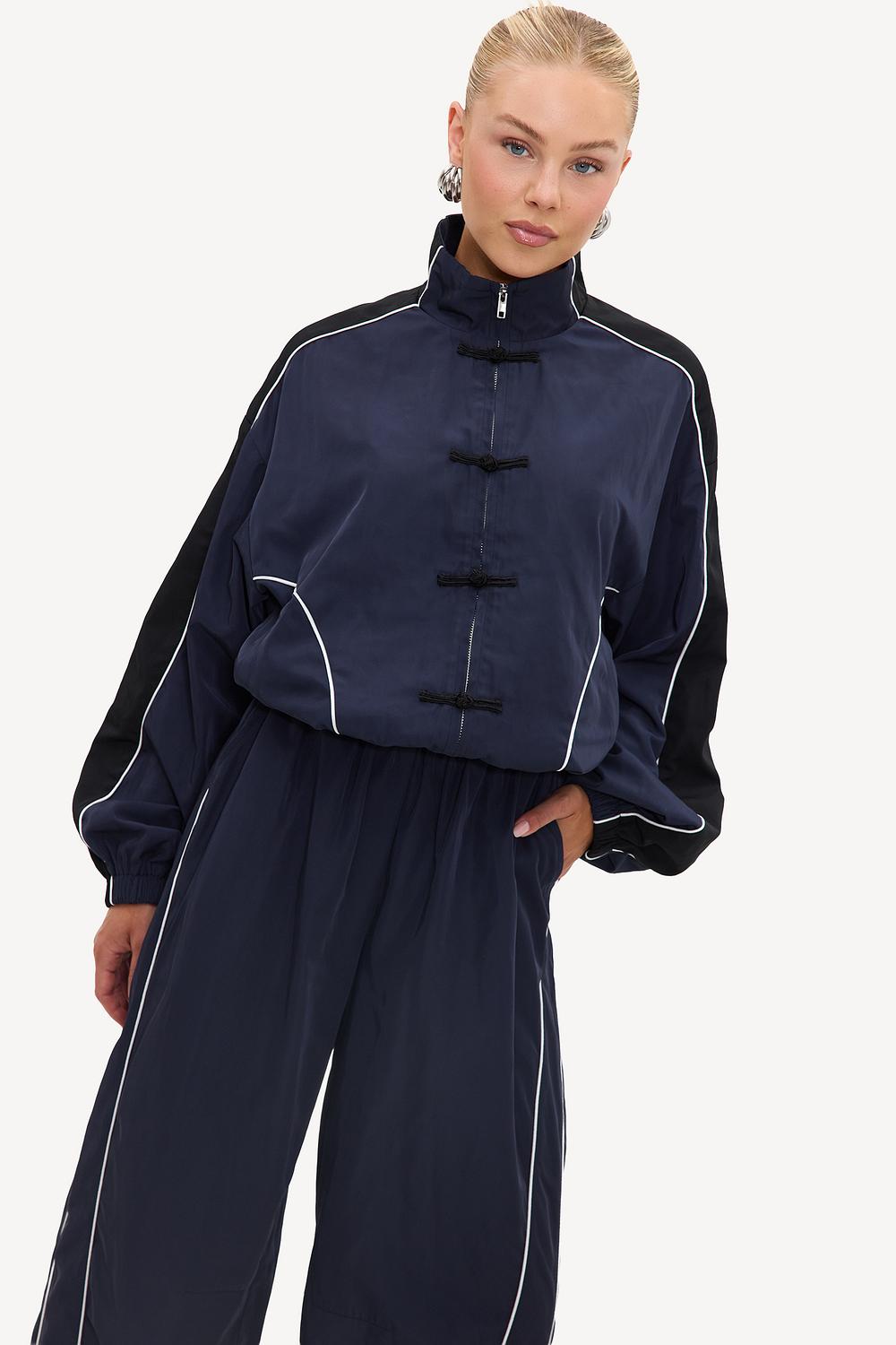 Dark blue jacket with white stripes