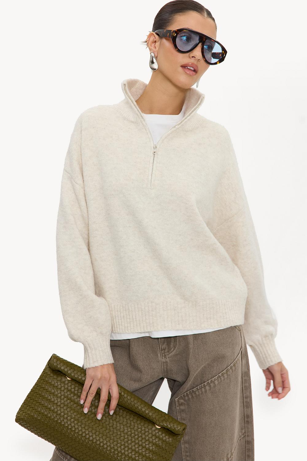 Pull beige clair à fermeture éclair