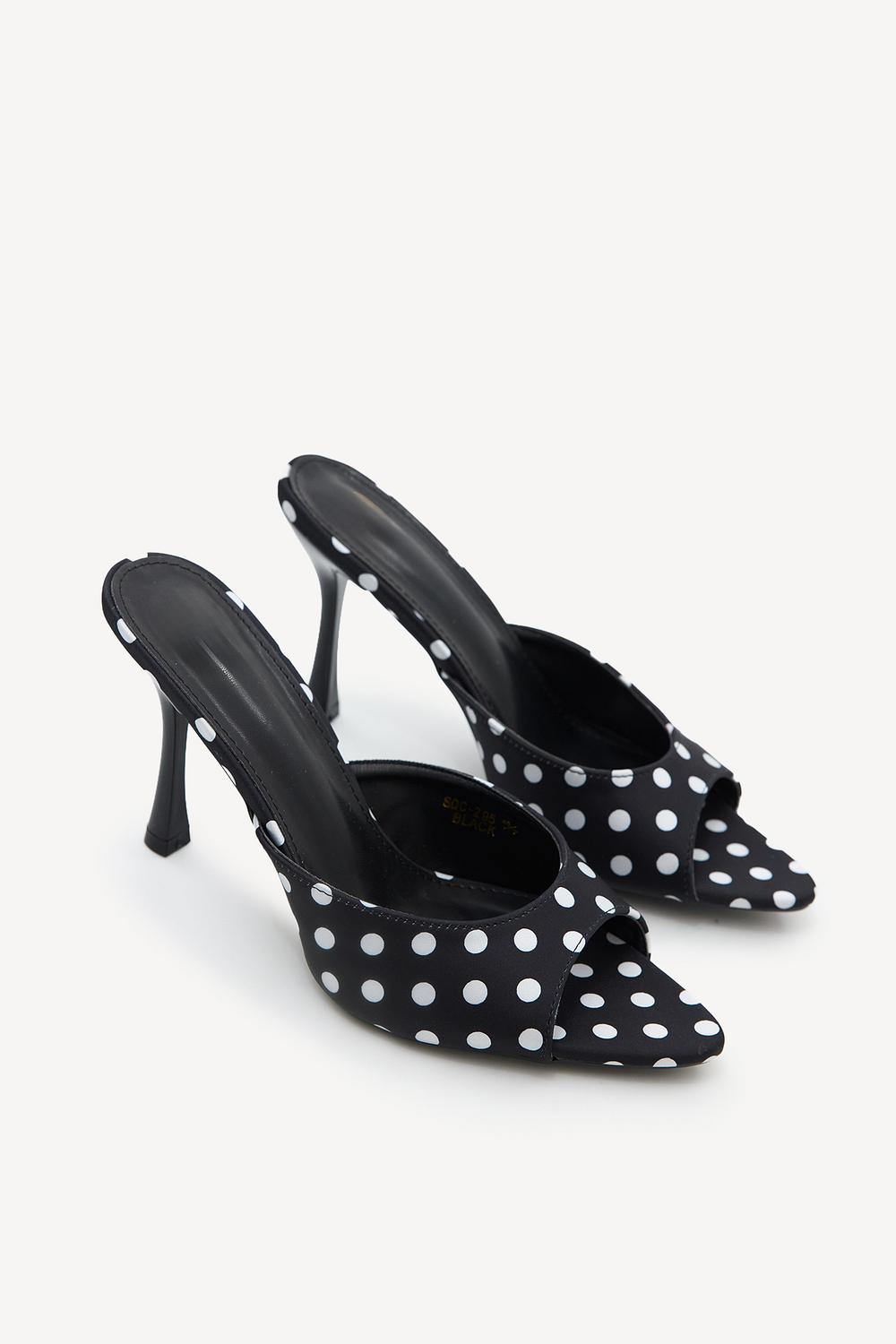 Black heels with white polka dots