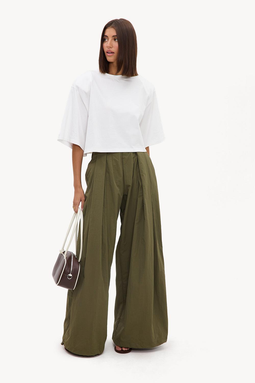 Dark green parachute pants