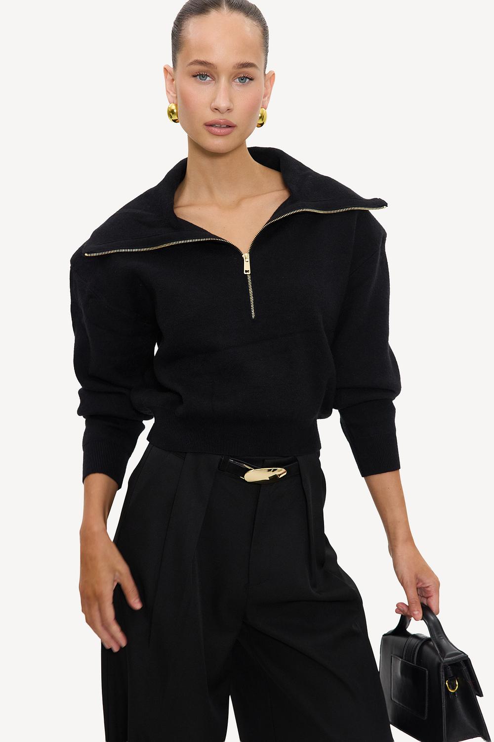 Black jumper with zip and shoulder pads
