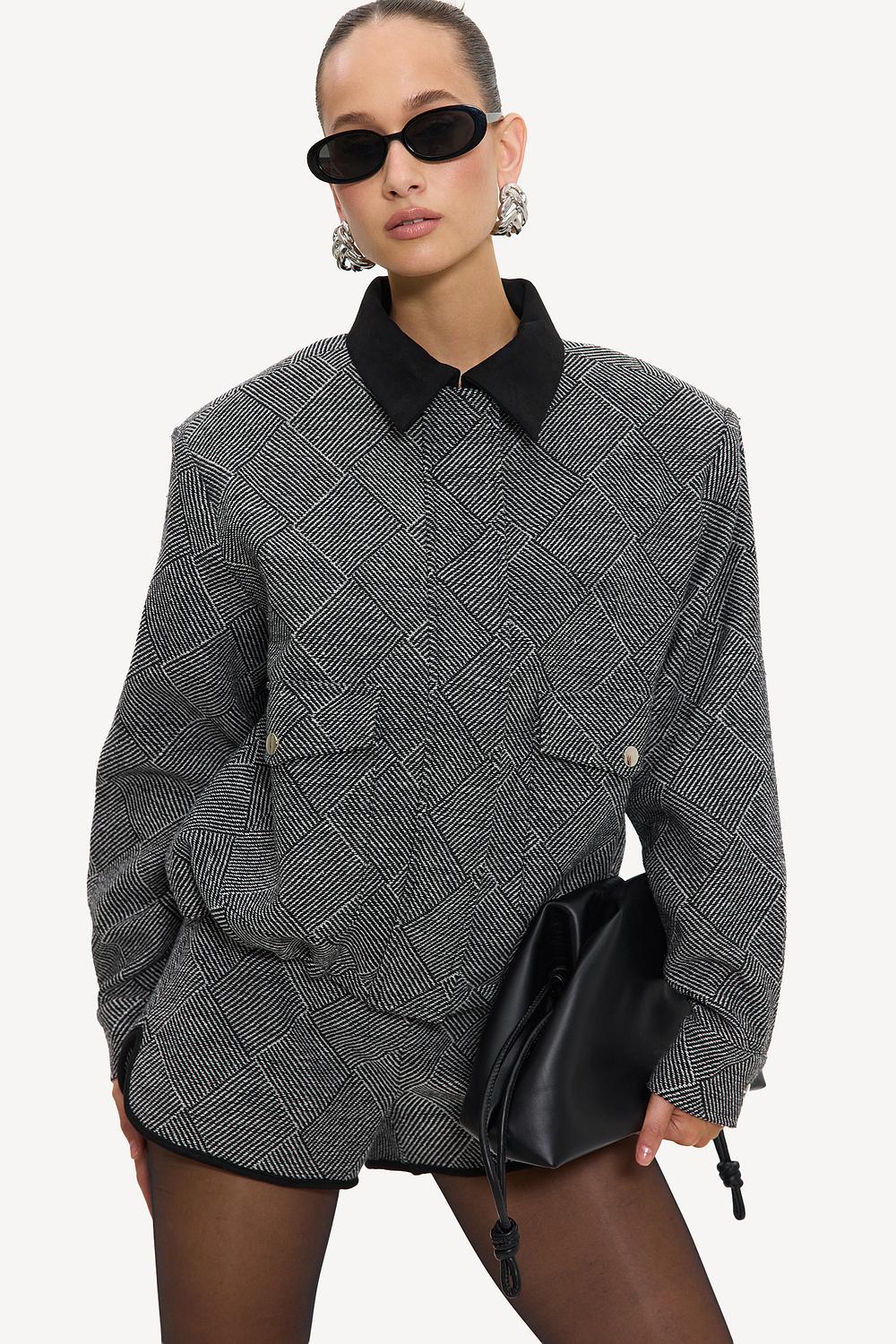 Chaqueta negra jaspeada