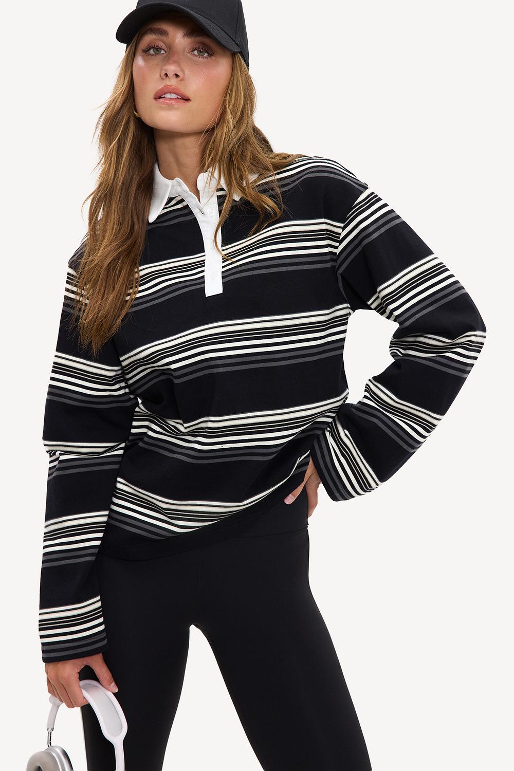 Black long-sleeved polo shirt with gray and off-white stripes