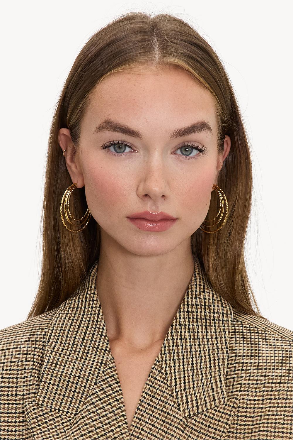 Gold earrings with double hoops