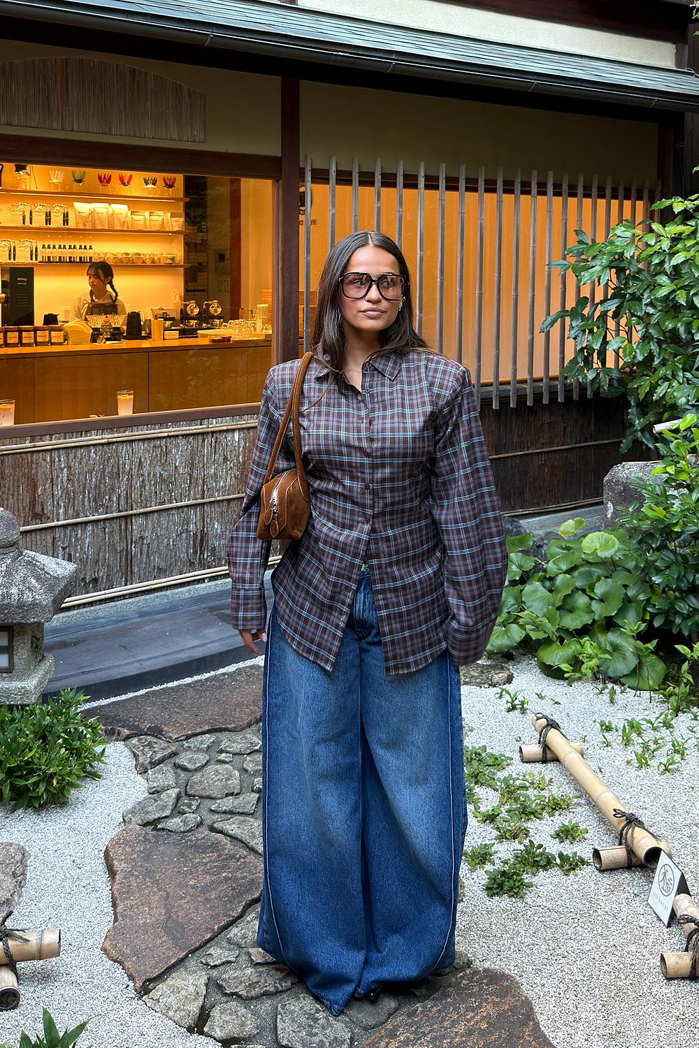 Brown blouse with blue checks and bow detail