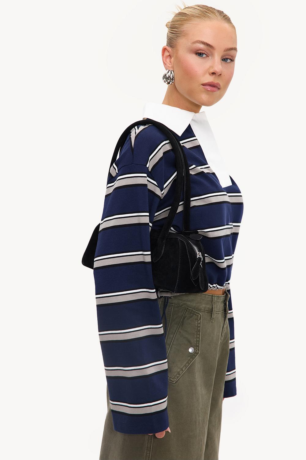 Bolso negro con efecto ante