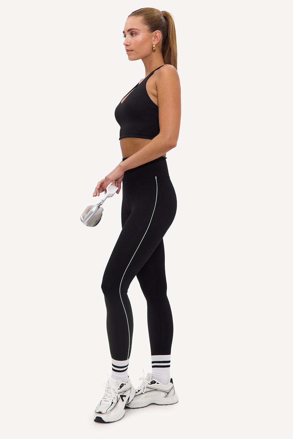 Black sports leggings with white details