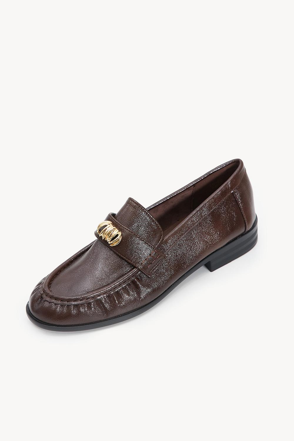 Brown loafers with gold detailing