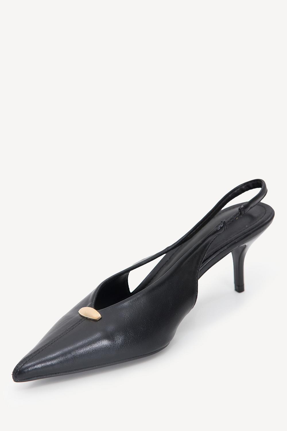 Black heels with gold detailing