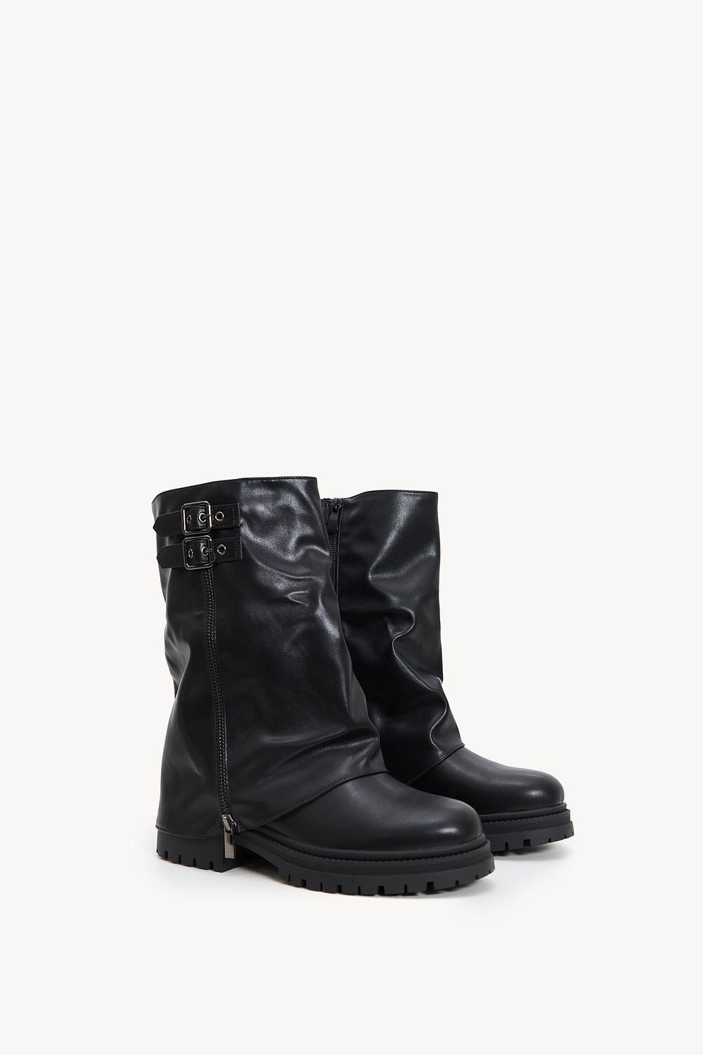 Black boots with silver buckles