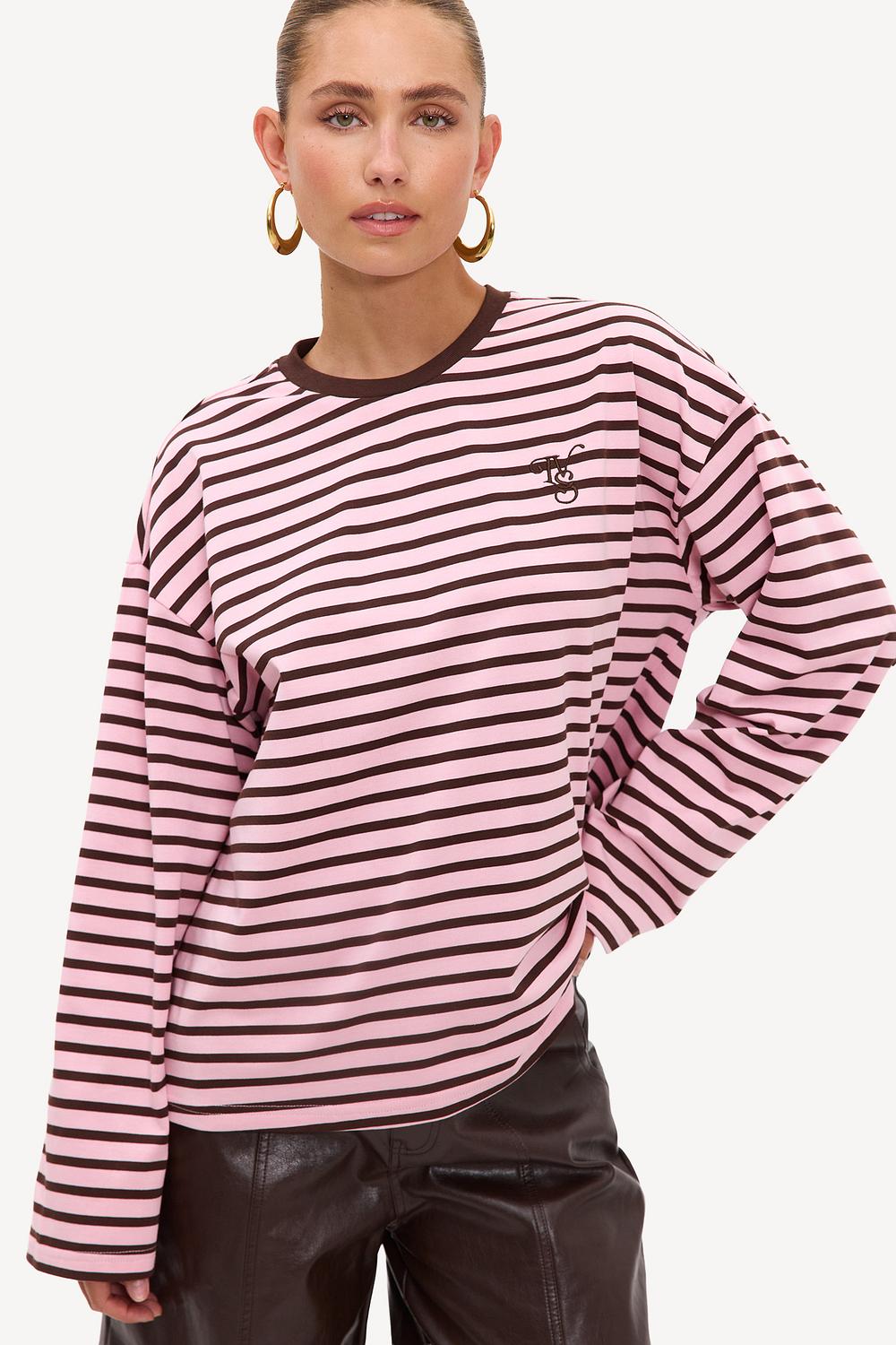 Pink long-sleeved top with brown stripes and logo