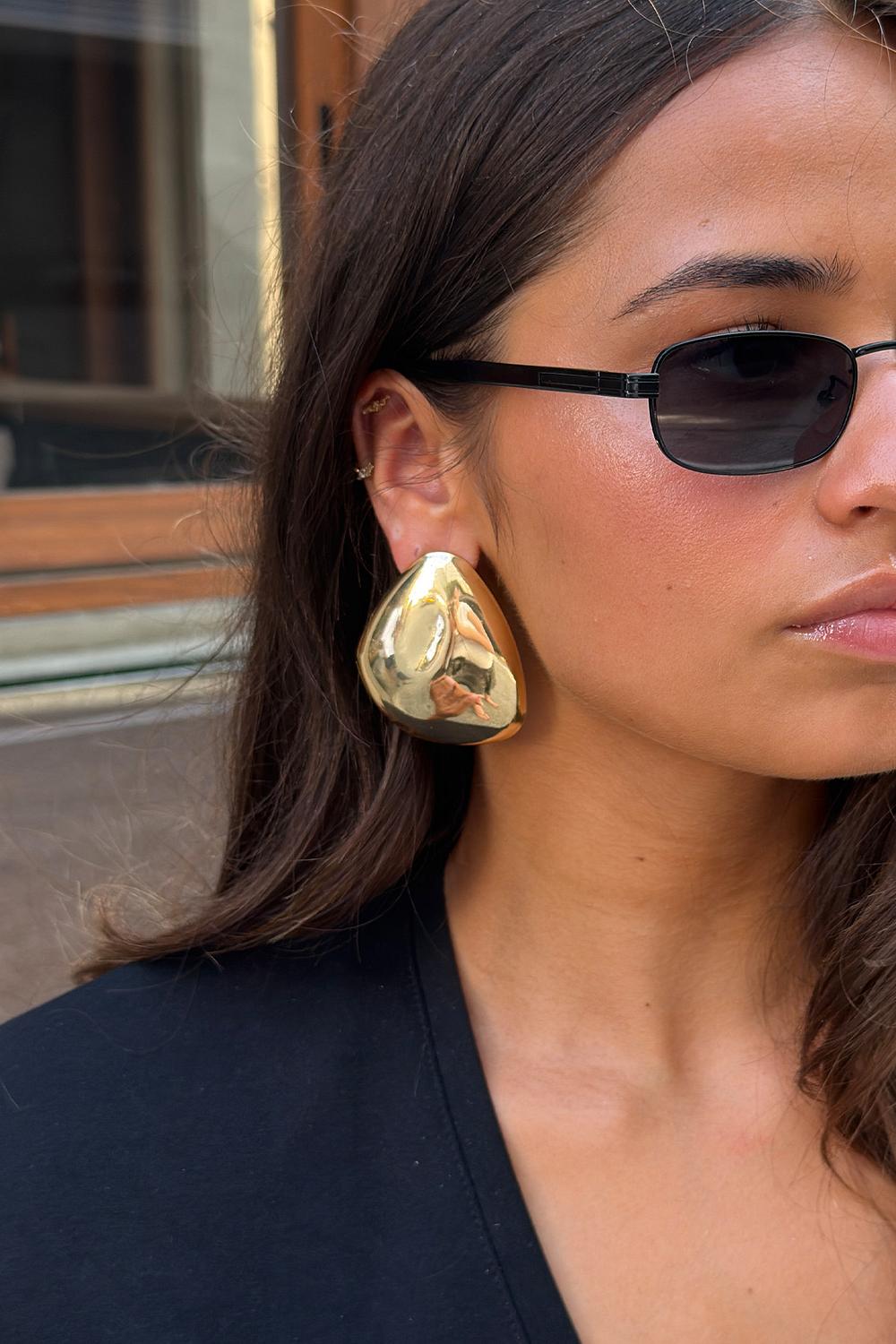 Gold statement earrings