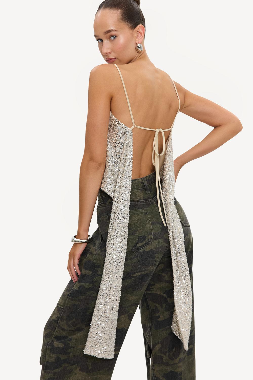 White top with sequins and bow detail