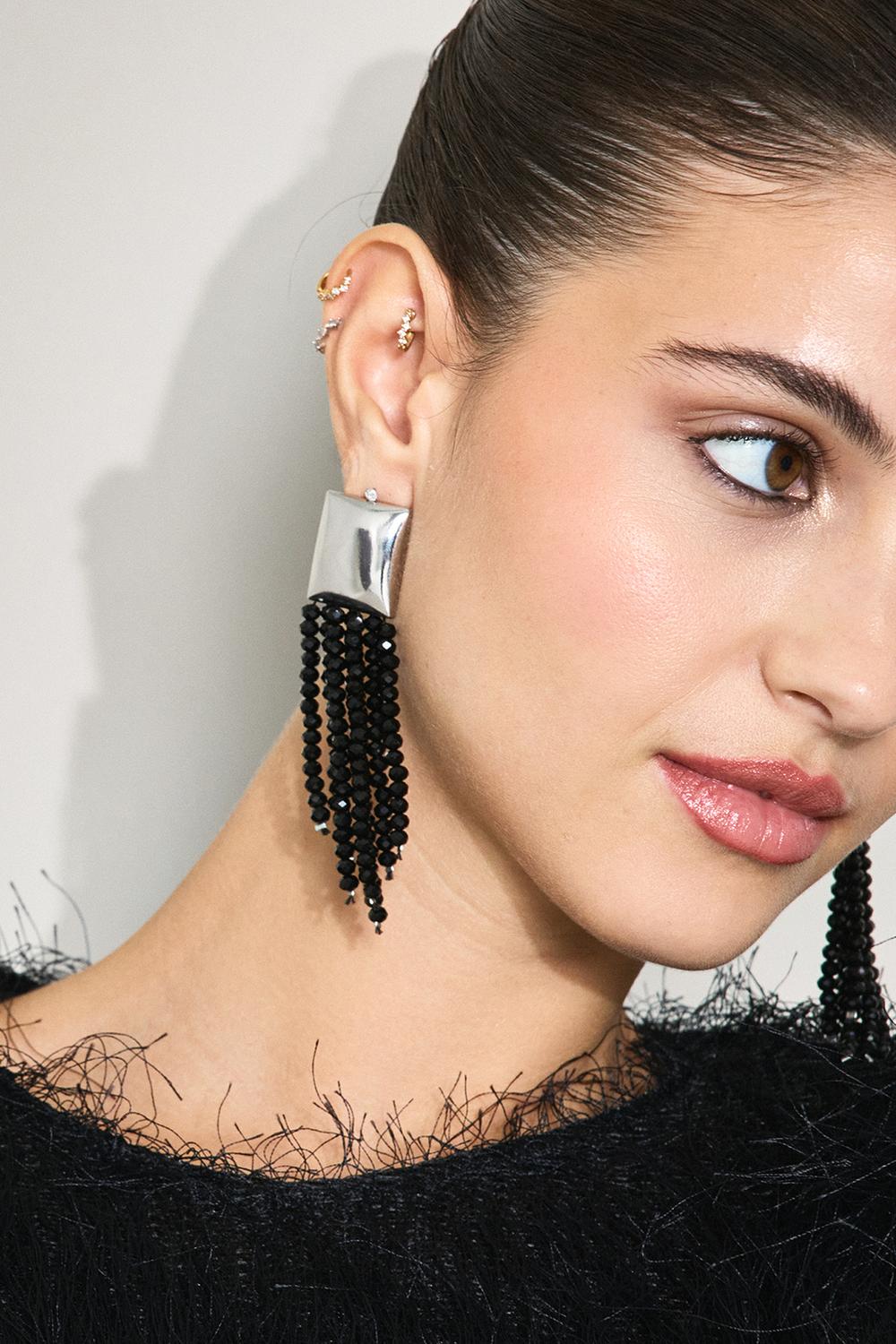 Silver earrings with black details