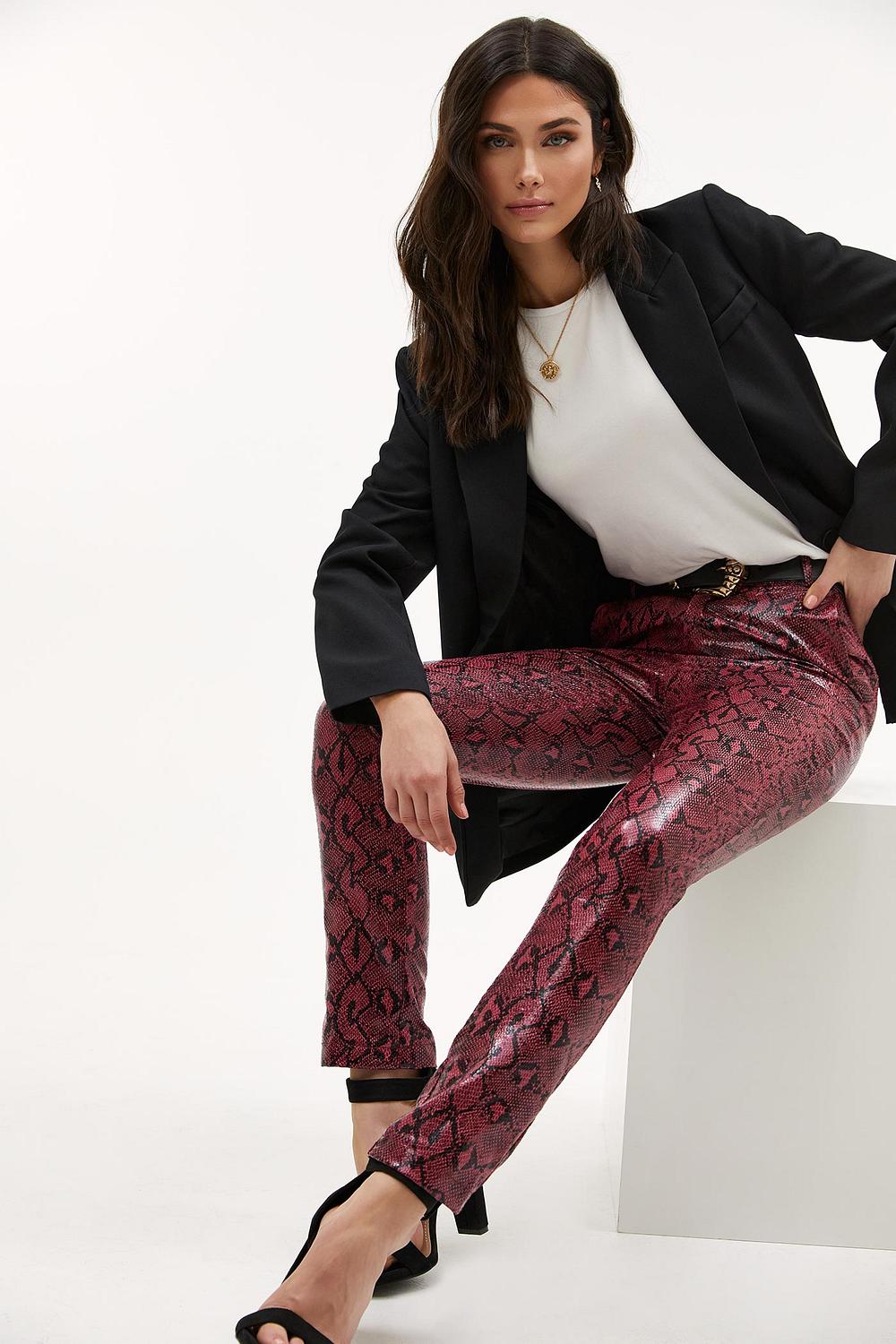 Pink trousers with snake print